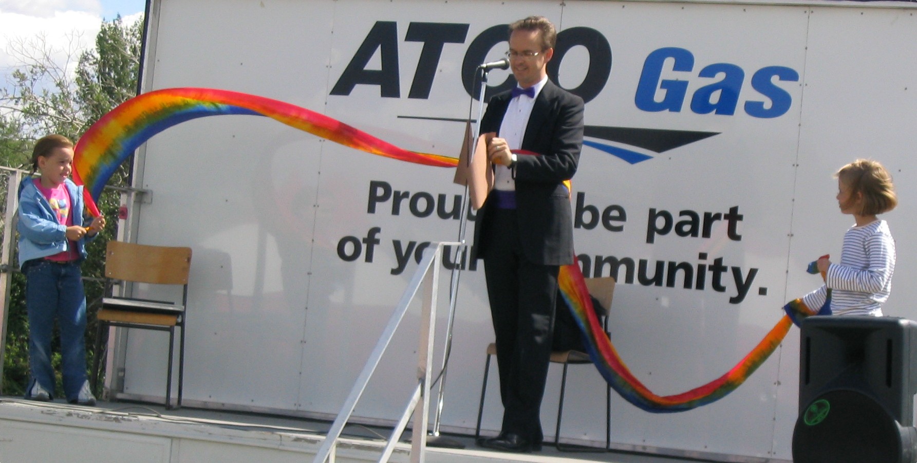 Richard Young the Magician and his rainbow streamer production