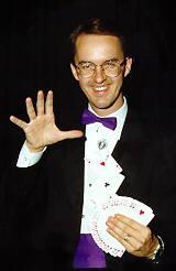 Richard Young the Magician performing card magic in Calgary, Alberta, Canada